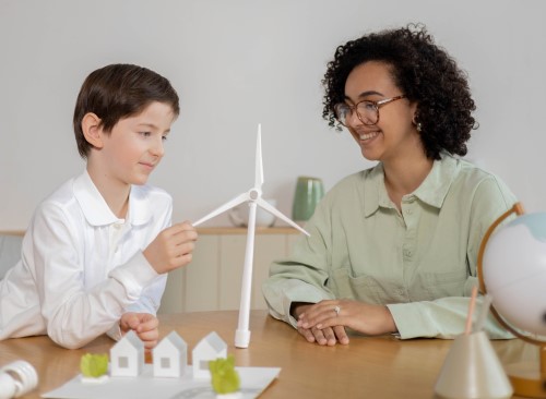 再生可能エネルギーについて話す大人と子供