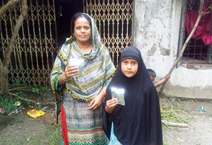 Photo-2: Koshi and her mother holding Euglena