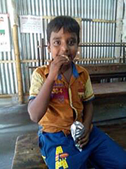 Photo-5: Suljo eating cookies