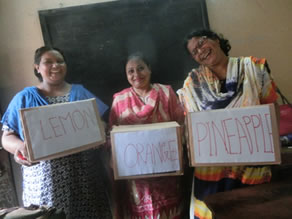 Photo-2: A teacher carrying a box containing three types of cookies