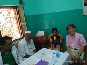 Photo-5: Children and local representatives receiving juice after a blood test