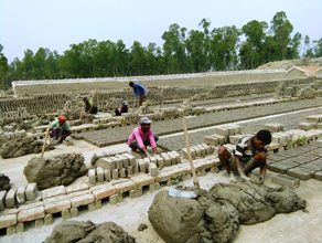 Photo-5: Clay is placed in a mold and lined up at a brick factory.