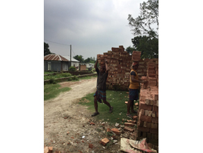 Photo-6: Carrying bricks on your head