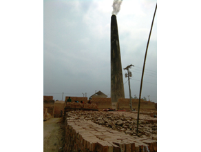 Photo-7: Smoke from the chimney of a brick factory