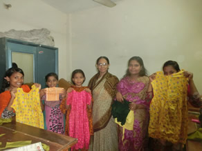 Photo-7: Mothers and children willing to show off the clothes they made in the classroom