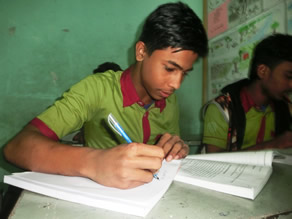 Photo-3: Yasmine studying at school