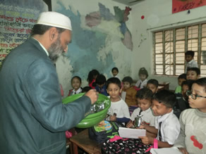 Photo-6: Principal Moinul distributing Euglena