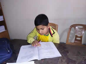 Photo-10: Children studying for exams