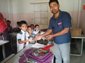 Photo-1: A child receiving a Euglena