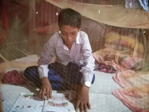 Photo-8: Children studying in mosquito nets