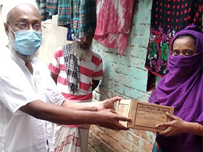 Photo-2: Volunteers handing cookies